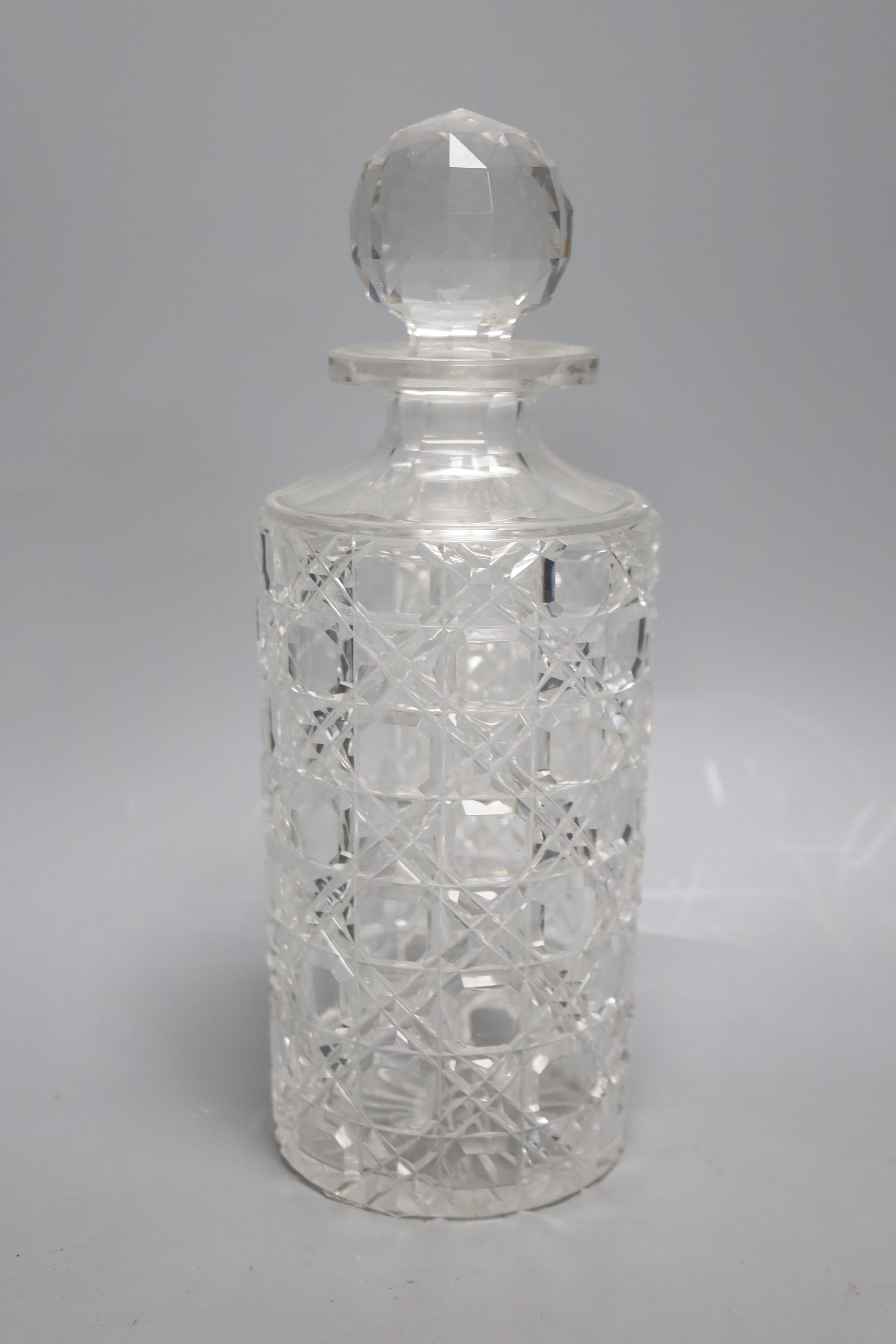 Two green glass dumps, a heavy cut glass bowl and a decanter
